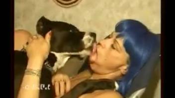 Insane bestiality porn clip featuring a young woman and her pet dog
