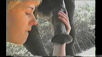 Stunning blonde babe passionately kisses a massive horse-like cock