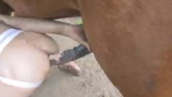 Animal enthusiast with a large rear end attempts anal intercourse with a horse