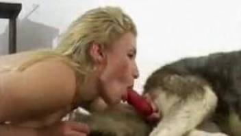 Hot blonde proves her slutty side by sucking dog until the last drop