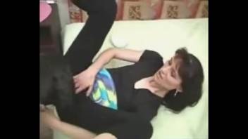 Skinny mature woman mounting a canine's dick after tearing her pantyhose
