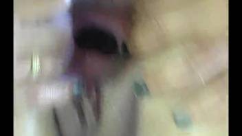 Huge hoop-wearing tramp blowing a thick shaft from a chestnut stallion