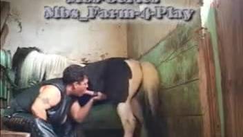 Older woman deep throating an enormous horse cock