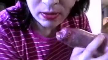 Novice whore swallows a canine's large crimson dick