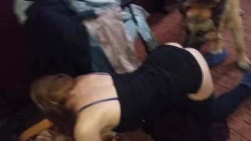 Blonde getting pounded by a dog with her trousers lowered