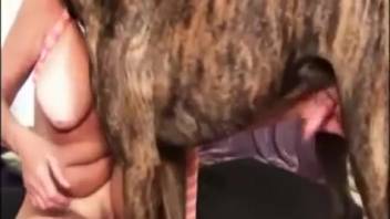 Busty blonde craves to swallow her dog's semen