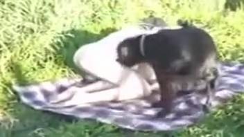 Excited woman captured in intimate close-ups while having sex with the dog