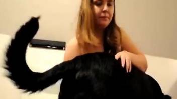 Busty woman likes to hang out and suck her dog's dick
