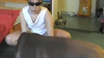 Solitary housewife records herself engaging in intercourse with the canine
