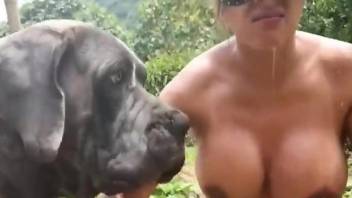 Masked hottie jerks off a dog and deepthroats its dick