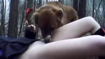 Fair-skinned animal-lover adolescent receives oral stimulation in the forest