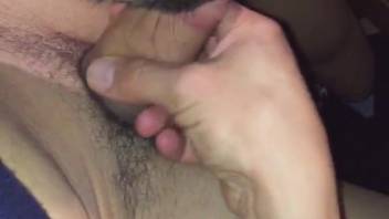 Guy masturbates as the dog licks and sniffs his erect cock