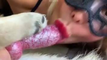 Blonde babe blowing a cock on a huge bed