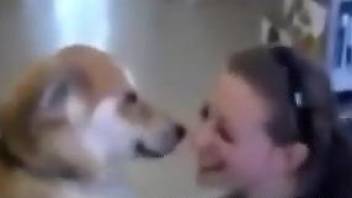 Romantic video in which a hot coed makes out with a dog