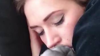 Pouty babe making out with a dirty animal on camera
