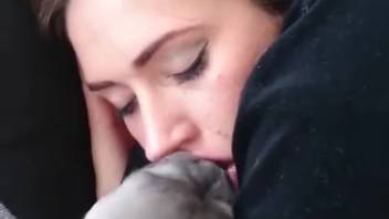 Sulky vixen smooching a filthy beast on film