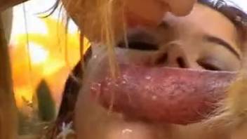 Two ladies demonstrate their impressive oral talents collaboratively
