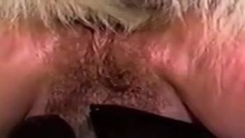 Fair-haired chick with a soaked pussy deep throating canine dick as well