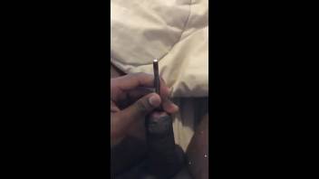 Sexy guy shoving larvae into his dick and climaxing