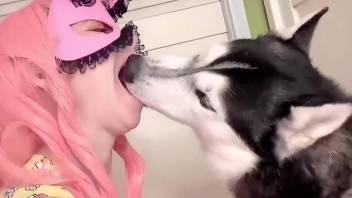 Pink mask hottie making out with her favorite pet