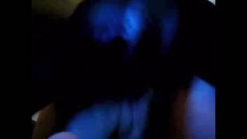 Pale woman is fucked by a black dog from the rear