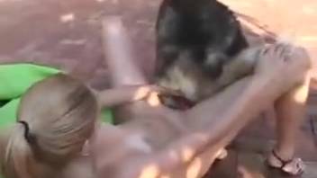 Adorable booty blonde gives head to dog's cock before rough pounding